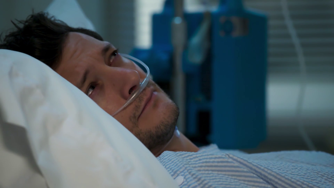 Finn Kelly (Rob Mills) wakes up from coma